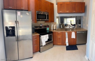 Discover the perfect blend of comfort, style, and luxury in this on Gateway Golf and Country Club in Florida - for sale on GolfHomes.com, golf home, golf lot