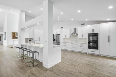 Step into modern elegance and timeless comfort with this on Bocaire Country Club in Florida - for sale on GolfHomes.com, golf home, golf lot