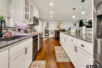 Welcome to your idyllic retreat nestled along the beautiful golf on Hide-A-Way Lake Golf Course in Texas - for sale on GolfHomes.com, golf home, golf lot