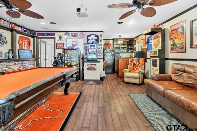 Welcome to your idyllic retreat nestled along the beautiful golf on Hide-A-Way Lake Golf Course in Texas - for sale on GolfHomes.com, golf home, golf lot