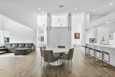 Step into modern elegance and timeless comfort with this on Bocaire Country Club in Florida - for sale on GolfHomes.com, golf home, golf lot