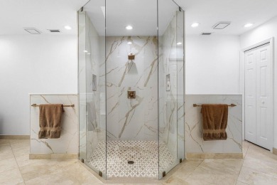 Step into modern elegance and timeless comfort with this on Bocaire Country Club in Florida - for sale on GolfHomes.com, golf home, golf lot