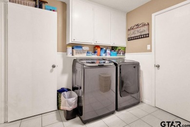 Welcome to your idyllic retreat nestled along the beautiful golf on Hide-A-Way Lake Golf Course in Texas - for sale on GolfHomes.com, golf home, golf lot