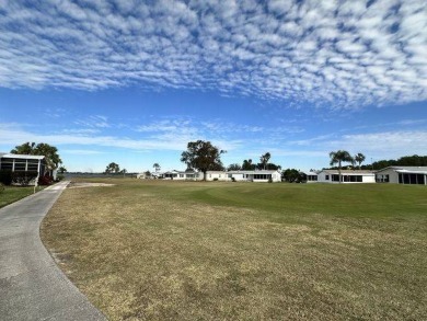 Step into this beautifully renovated three bedroom, two bath on Four Lakes Golf Club in Florida - for sale on GolfHomes.com, golf home, golf lot