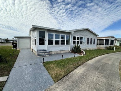 Step into this beautifully renovated three bedroom, two bath on Four Lakes Golf Club in Florida - for sale on GolfHomes.com, golf home, golf lot