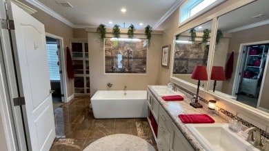 This 3 bedroom split Malibu is a popular floor plan and has on Water Oak Country Club Estates in Florida - for sale on GolfHomes.com, golf home, golf lot