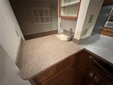 Come see this 3-bedroom 2-bathroom 2 car garage block home on Babe Zaharias Golf Course in Florida - for sale on GolfHomes.com, golf home, golf lot