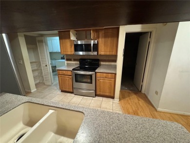 Come see this 3-bedroom 2-bathroom 2 car garage block home on Babe Zaharias Golf Course in Florida - for sale on GolfHomes.com, golf home, golf lot
