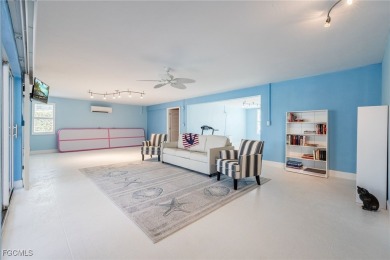 VACATION AND LIVE THE LUXURIOUS TROPICAL ISLAND LIFE WITHOUT on Beachview Golf Club in Florida - for sale on GolfHomes.com, golf home, golf lot