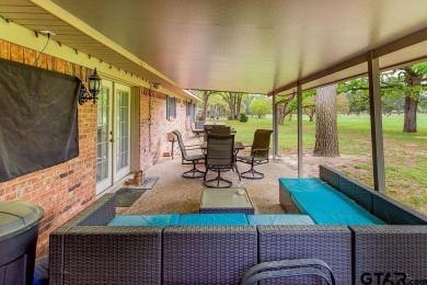 Welcome to your idyllic retreat nestled along the beautiful golf on Hide-A-Way Lake Golf Course in Texas - for sale on GolfHomes.com, golf home, golf lot