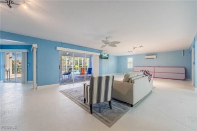 VACATION AND LIVE THE LUXURIOUS TROPICAL ISLAND LIFE WITHOUT on Beachview Golf Club in Florida - for sale on GolfHomes.com, golf home, golf lot