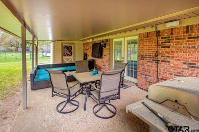 Welcome to your idyllic retreat nestled along the beautiful golf on Hide-A-Way Lake Golf Course in Texas - for sale on GolfHomes.com, golf home, golf lot