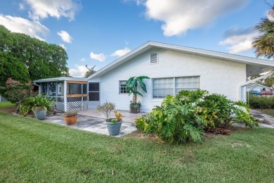 Discover the perfect blend of comfort, space, and location in on Palm Harbor Golf Club in Florida - for sale on GolfHomes.com, golf home, golf lot