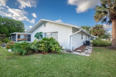 Discover the perfect blend of comfort, space, and location in on Palm Harbor Golf Club in Florida - for sale on GolfHomes.com, golf home, golf lot