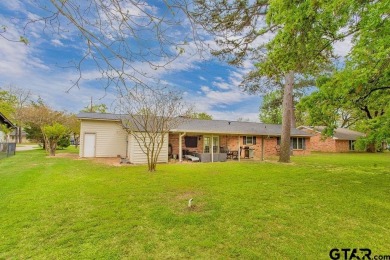 Welcome to your idyllic retreat nestled along the beautiful golf on Hide-A-Way Lake Golf Course in Texas - for sale on GolfHomes.com, golf home, golf lot