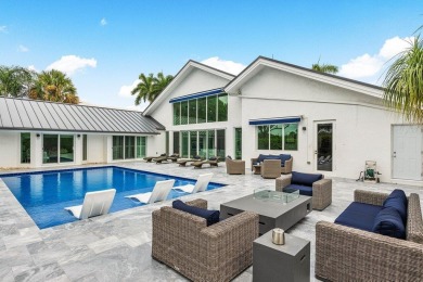 Step into modern elegance and timeless comfort with this on Bocaire Country Club in Florida - for sale on GolfHomes.com, golf home, golf lot