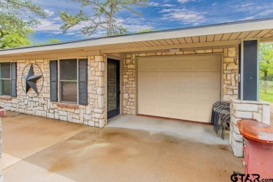 Welcome to your idyllic retreat nestled along the beautiful golf on Hide-A-Way Lake Golf Course in Texas - for sale on GolfHomes.com, golf home, golf lot