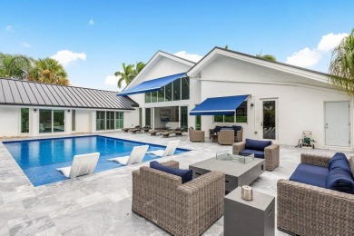 Step into modern elegance and timeless comfort with this on Bocaire Country Club in Florida - for sale on GolfHomes.com, golf home, golf lot