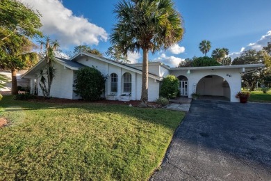 Discover the perfect blend of comfort, space, and location in on Palm Harbor Golf Club in Florida - for sale on GolfHomes.com, golf home, golf lot