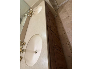 Come see this 3-bedroom 2-bathroom 2 car garage block home on Babe Zaharias Golf Course in Florida - for sale on GolfHomes.com, golf home, golf lot