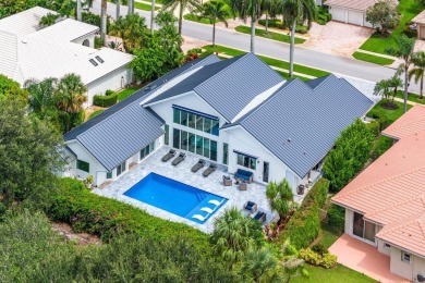 Step into modern elegance and timeless comfort with this on Bocaire Country Club in Florida - for sale on GolfHomes.com, golf home, golf lot
