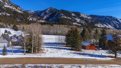Nestled in the heart of Star Valley Ranch, this premium golf on Star Valley RV Golf Course in Wyoming - for sale on GolfHomes.com, golf home, golf lot