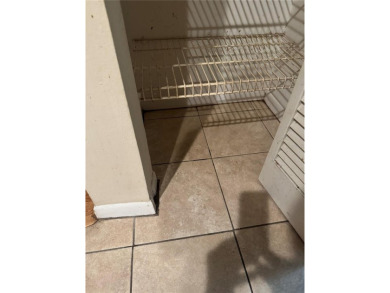 Come see this 3-bedroom 2-bathroom 2 car garage block home on Babe Zaharias Golf Course in Florida - for sale on GolfHomes.com, golf home, golf lot