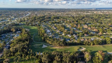 Discover the perfect blend of comfort, space, and location in on Palm Harbor Golf Club in Florida - for sale on GolfHomes.com, golf home, golf lot