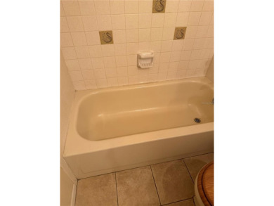 Come see this 3-bedroom 2-bathroom 2 car garage block home on Babe Zaharias Golf Course in Florida - for sale on GolfHomes.com, golf home, golf lot