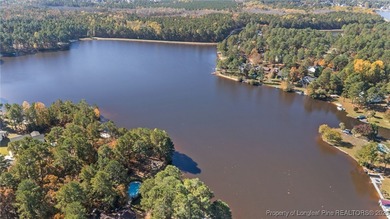 Escape to the sought-after, gated community of Carolina Lakes on Carolina Lakes Country Club in North Carolina - for sale on GolfHomes.com, golf home, golf lot