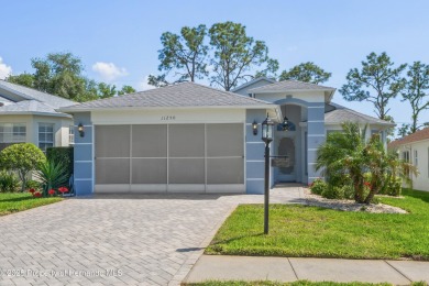 This immaculately maintained St. Andrews model is light and on Heritage Pines Country Club in Florida - for sale on GolfHomes.com, golf home, golf lot