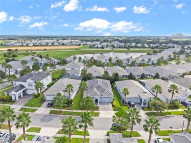 FULL GOLF & TENNIS MEMBERSHP INCLUDED.  Step into luxury living on The Oasis Club at Champions Gate in Florida - for sale on GolfHomes.com, golf home, golf lot