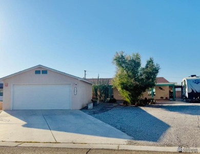 Enjoy this two-bedroom home with a detached two- car garage that on The Links At Coyote Wash in Arizona - for sale on GolfHomes.com, golf home, golf lot