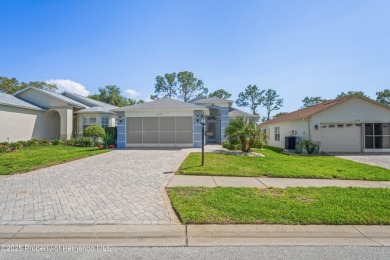 This immaculately maintained St. Andrews model is light and on Heritage Pines Country Club in Florida - for sale on GolfHomes.com, golf home, golf lot