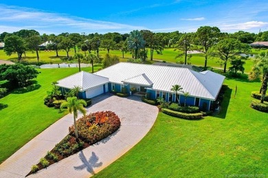 This 4BR/3BA CBS pool home sits on a private 1-acre cul-de-sac on Evergreen Club in Florida - for sale on GolfHomes.com, golf home, golf lot