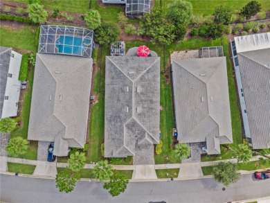 FULL GOLF & TENNIS MEMBERSHP INCLUDED.  Step into luxury living on The Oasis Club at Champions Gate in Florida - for sale on GolfHomes.com, golf home, golf lot