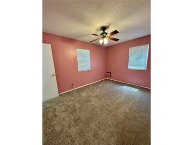 Welcome to this well-maintained, one-owner home offering three on Silverhorn Golf Club in Oklahoma - for sale on GolfHomes.com, golf home, golf lot