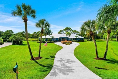 This 4BR/3BA CBS pool home sits on a private 1-acre cul-de-sac on Evergreen Club in Florida - for sale on GolfHomes.com, golf home, golf lot
