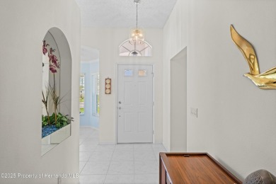 This immaculately maintained St. Andrews model is light and on Heritage Pines Country Club in Florida - for sale on GolfHomes.com, golf home, golf lot