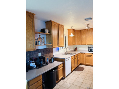 Enjoy this two-bedroom home with a detached two- car garage that on The Links At Coyote Wash in Arizona - for sale on GolfHomes.com, golf home, golf lot