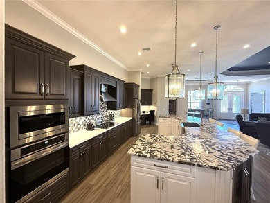 5 Bedroom Custom Home | Boat & RV Garage | Outdoor Kitchen | on Juliette Falls Golf and Spa Club in Florida - for sale on GolfHomes.com, golf home, golf lot