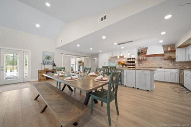 This 4BR/3BA CBS pool home sits on a private 1-acre cul-de-sac on Evergreen Club in Florida - for sale on GolfHomes.com, golf home, golf lot