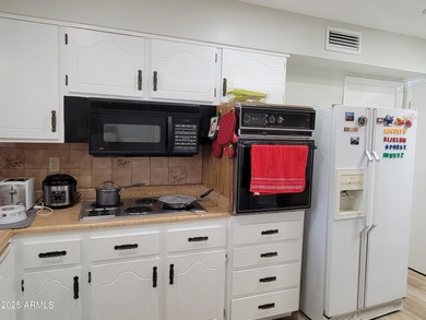 Newly upgraded. New vinyl floor plank throughout the house. New on Sun City Country Club in Arizona - for sale on GolfHomes.com, golf home, golf lot