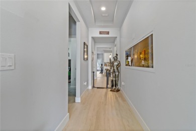 FULL GOLF & TENNIS MEMBERSHP INCLUDED.  Step into luxury living on The Oasis Club at Champions Gate in Florida - for sale on GolfHomes.com, golf home, golf lot