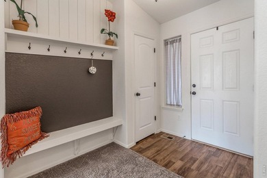 Situated on a desirable corner lot, this home offers added on Raindance National Golf Course in Colorado - for sale on GolfHomes.com, golf home, golf lot