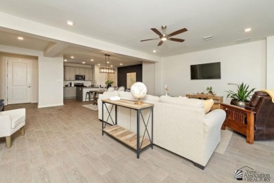 Better than new! Experience Arizona living at its finest in this on Las Barrancas Golf Course in Arizona - for sale on GolfHomes.com, golf home, golf lot