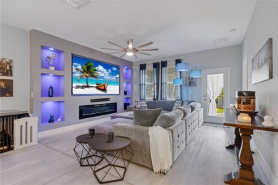 FULL GOLF & TENNIS MEMBERSHP INCLUDED.  Step into luxury living on The Oasis Club at Champions Gate in Florida - for sale on GolfHomes.com, golf home, golf lot