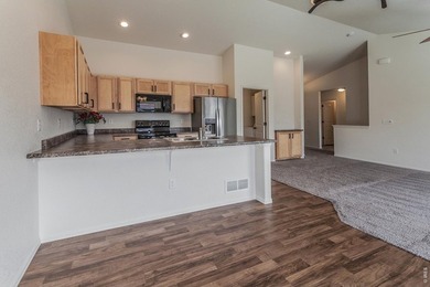 Situated on a desirable corner lot, this home offers added on Raindance National Golf Course in Colorado - for sale on GolfHomes.com, golf home, golf lot