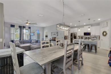 FULL GOLF & TENNIS MEMBERSHP INCLUDED.  Step into luxury living on The Oasis Club at Champions Gate in Florida - for sale on GolfHomes.com, golf home, golf lot