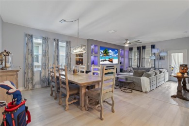 FULL GOLF & TENNIS MEMBERSHP INCLUDED.  Step into luxury living on The Oasis Club at Champions Gate in Florida - for sale on GolfHomes.com, golf home, golf lot